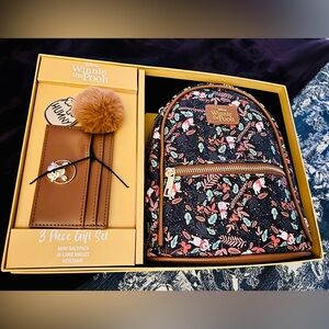 New in box. Winnie the Pooh mini backpack, ID Wallet and Keychain